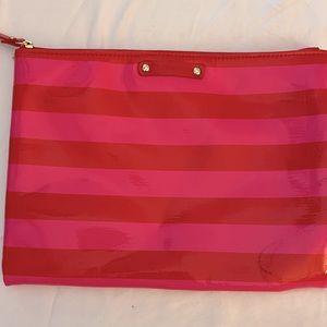 Kate Spade clutch or makeup bag.